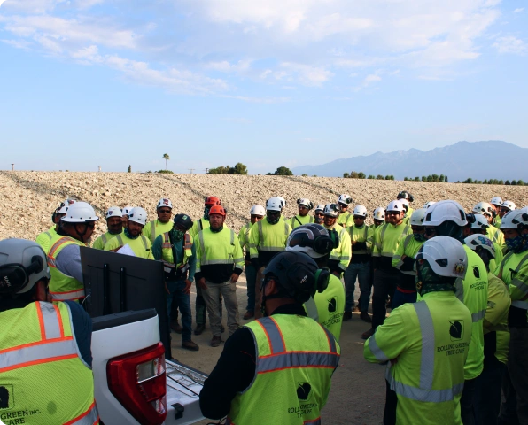 Team of tree care specialists participating in a safety briefing to ensure proper procedures.